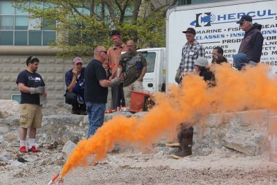 Ted Williams of Hercules SLR Inc. teaches fishermen about different types of emergency flares.