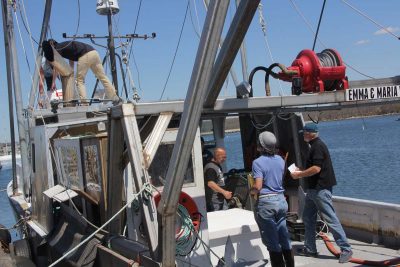 Fishermen practice an abandon ship drill aboard Michael Theiler's vessel during drill conductor training on May 11.