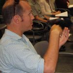 Tim Pusack, assistant professor in the Maritime Studies Program of Williams College and Mystic Seaport, asks a question during the forum.