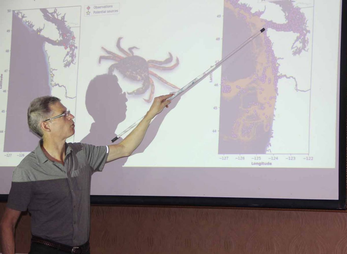 Parker MacCready of the University of Washinton shows an image of the ocean model he helped create during his plenary talk.