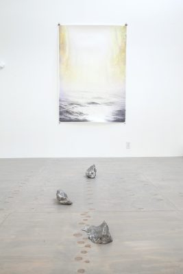 Sea coal and open water images are used in this work by artist Joseph Smolinski.