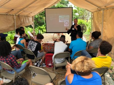 Alicia Tyson leads a workshop for youth in Puerto Rico to explore the value of conservation and stewardship.