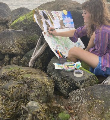 Bonnie Rose Sullivan works on an illustration of kelp for her book about ocean farming.