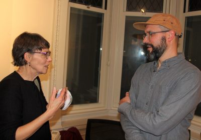 Artists Kathryn Frund, left, and Joseph Smolinski chat during the Nov. 3 opening.
