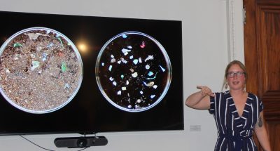 Artist Elizabeth Ellenwood talks about works she created using bits of plastic during a presentation for the Nov. 3 opening of the two exhibits.