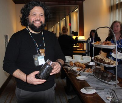 Keolani Booth, who gave one of the keynote addresses, shared a jar of dried seaweed he harvested to sprinkle on salad at the lunch buffet after his talk.