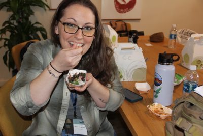Brianna Shaughnessy, aquaculture literacy coordinator with NOAA, samples one of the dishes prepared with seaweed at the culinary workshop.