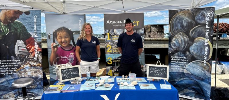 Tessa Getchis and Mike Gilman represented CT Sea Grant at the Blessing of the Fleet in Stonington on July 30. Hundreds of people turned out for the annual event that included a Mass, parade, ceremony, food and music.