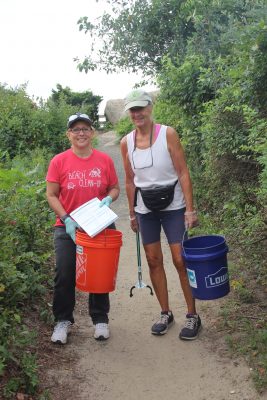 Colleen Klump of Madison, left, and Susan Rood of Branford were among the 30 volunteers who participated in the cleanup.